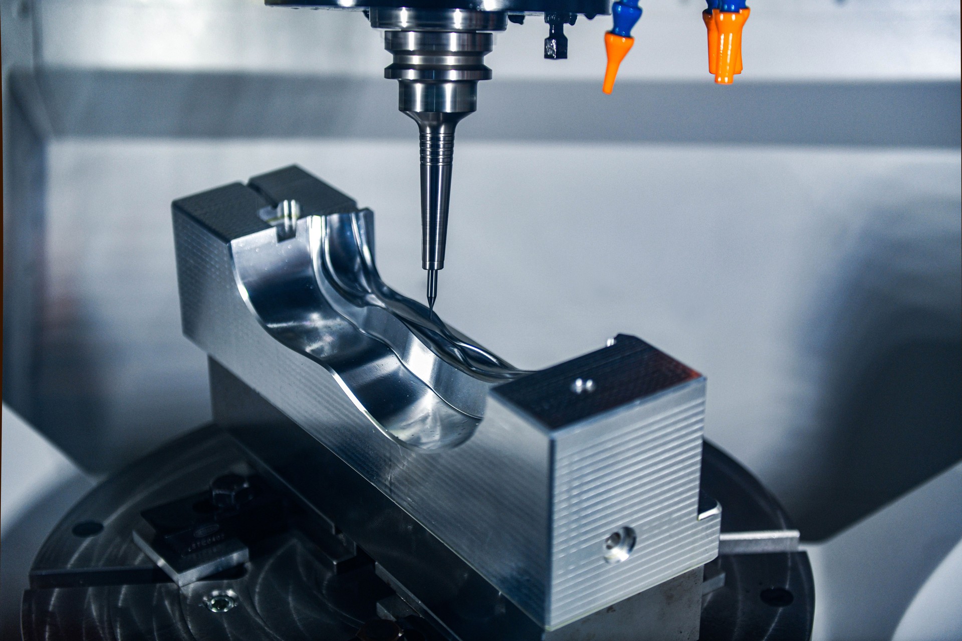 CNC mills machines for design configuration that utilizes a swivel head machine table flush with the surface, metalworking industrial